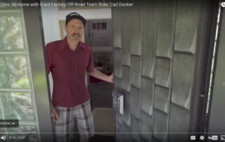 screenshot of carl decker opening his front door